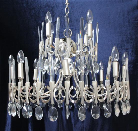 A Gaetano Sciolari Ovali silvered metal and crystal two-tier chandelier, c.1970s Diam. 2ft 1in. Drop 2ft 4in(-)